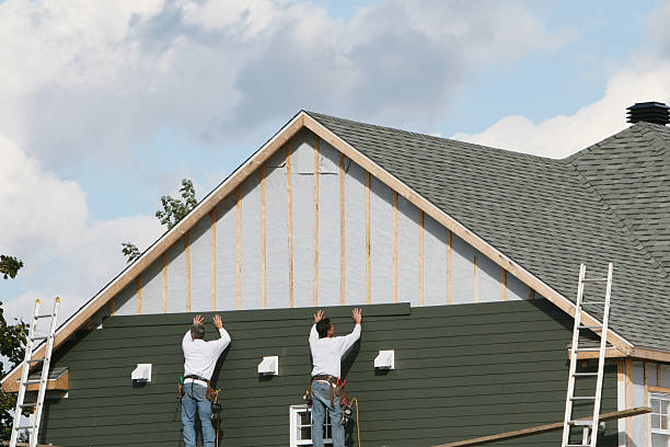 Professional Siding technician working in Galesville, MD